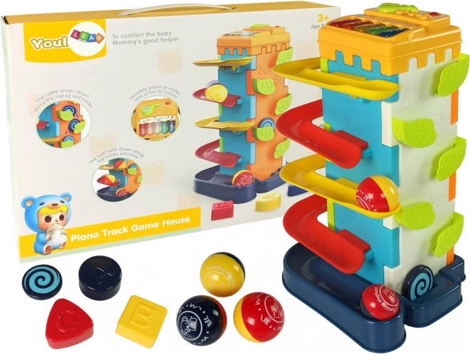Educatieve kubus met ballenglijbaan en pianootje