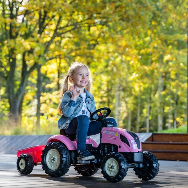 Tractor trapauto County Star met roze aanhangwagen