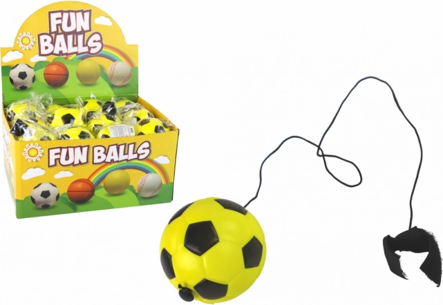 Jojo-voetbalballetje aan elastiek 6 cm – geel