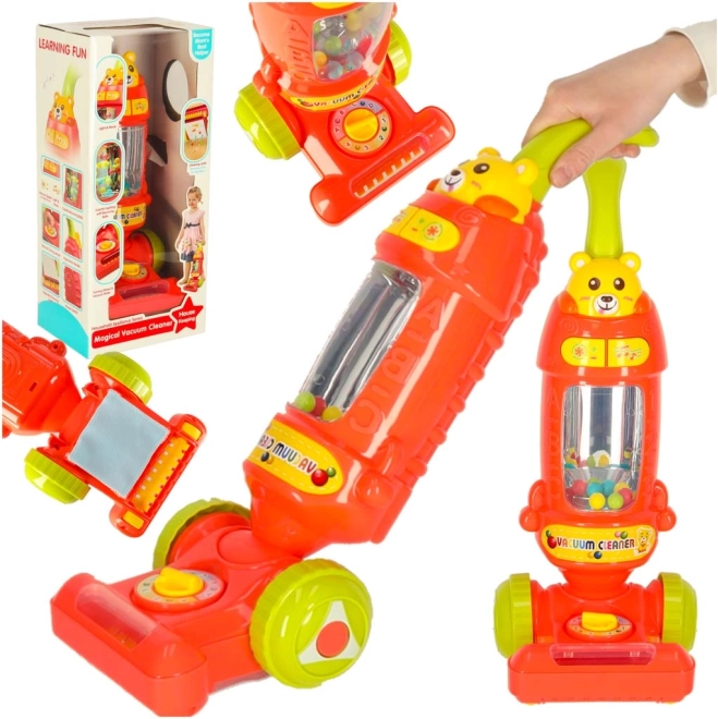 Interactieve kindersteelstofzuiger met geluiden frambooskleurig 46 cm