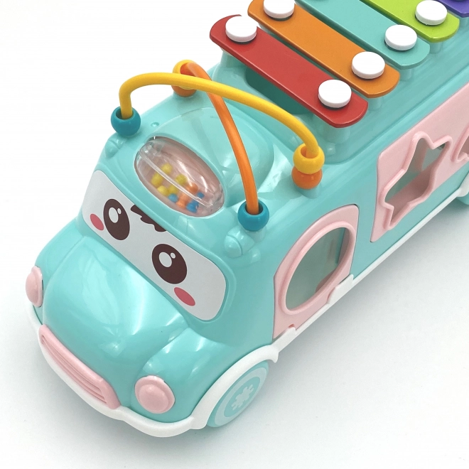 Muzikale autootje met sorter met xylofoon groen Woopie