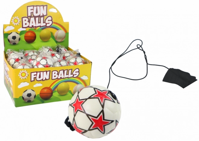 Voetbaljojo aan elastiek 6 cm – wit met sterretjes
