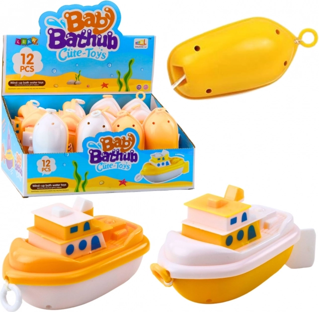 Opwindbaar badspeeltje boot wit-geel