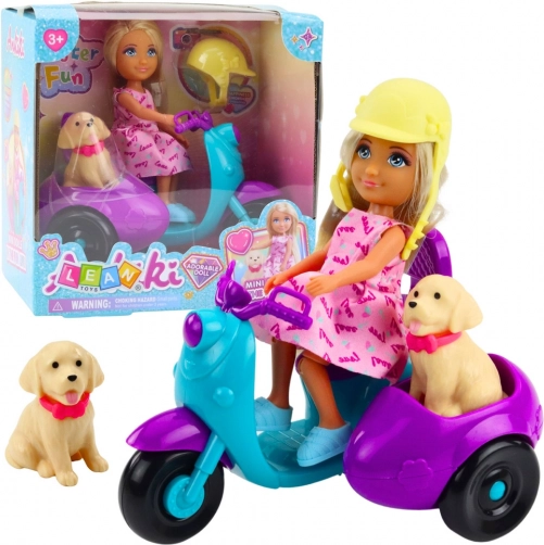 Poppenset Ankiki op een scooter met hond