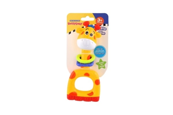 Rammelaar/bijtring/fluitje giraffe plastic 7x16cm op kaart 3m+