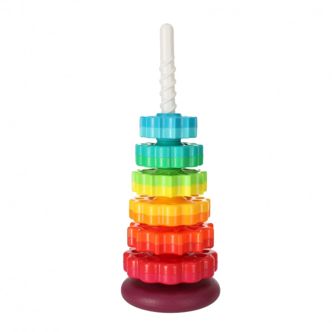 Regenboogtor met tandwiel en spiraal