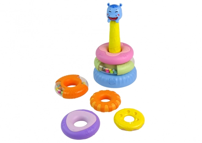 Educatieve piramide met gekleurde ringen / donuts
