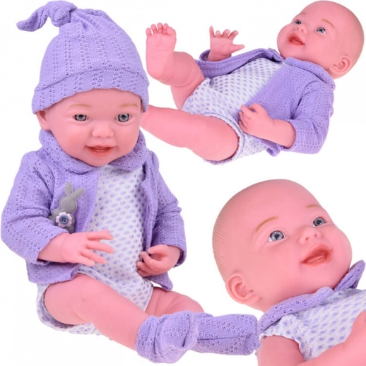 Lachende babypop 40 cm met paars vestje