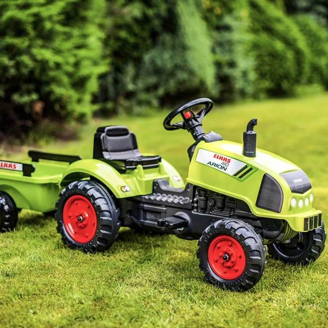 Traptractor Claas Arion 410 met aanhanger