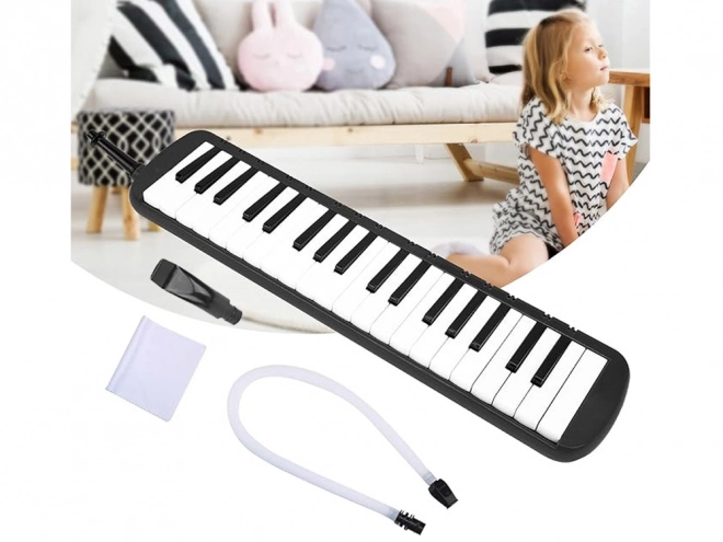 Melodica met toetsenbord en hoes