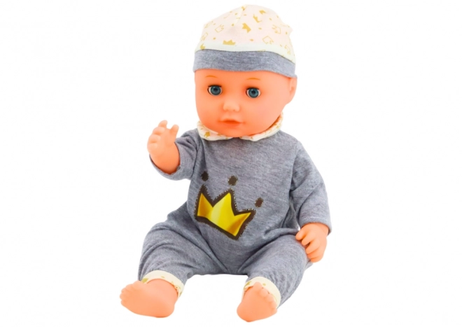 Interactieve babypop in grijze pyjama