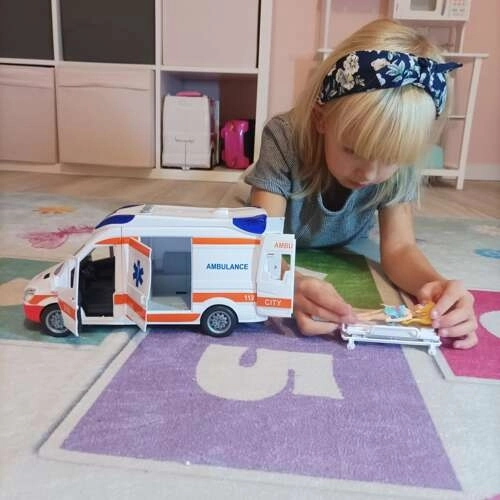 Kinderambulance met brancard en lichtsignalen