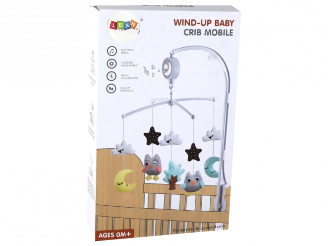 Babymobiel boven bedje met muziekdoos wit