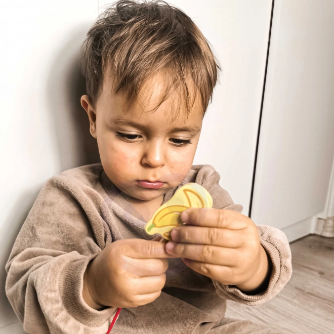 Houten rijgblokken met fruit