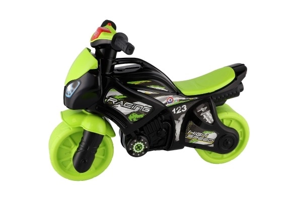 Loopfiets motor groen-zwart plastic op batterij met licht en geluid in zak 36x53x74cm