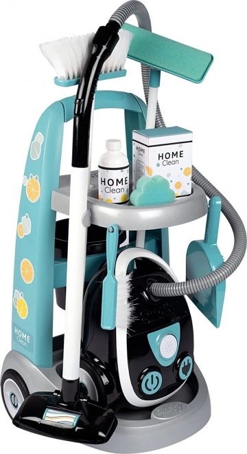 Turkoois-witte schoonmaaktrolley met stofzuiger voor kleine schoonmaakster