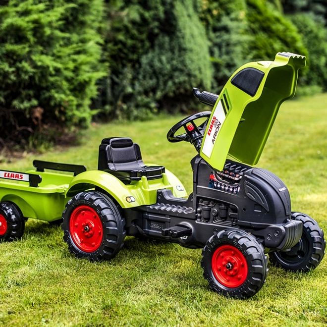 Traptractor Claas Arion 410 met aanhanger