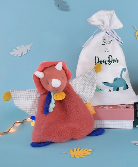 Doudou cadeau set - speeltje met fopspeenhouder dinosaurus roze