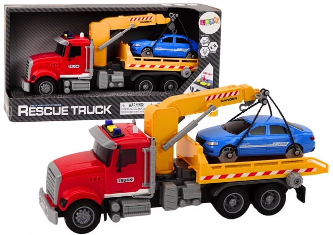 Rode sleepwagen met kraan en lichteffecten