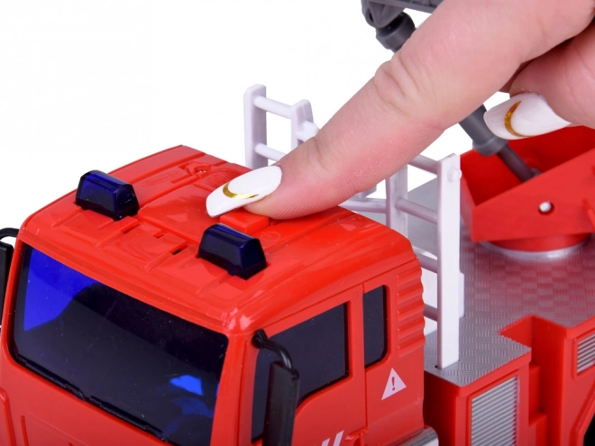 Grote brandweerwagen met geluid en kinderhelm