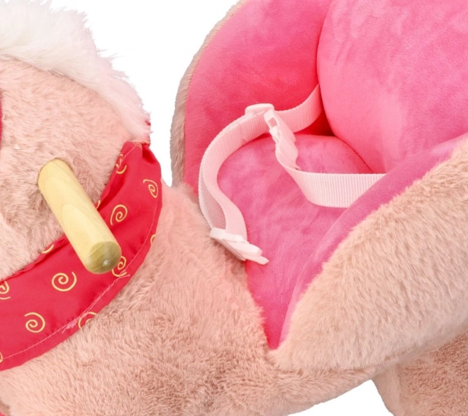 Roze eenhoorn met autostoel