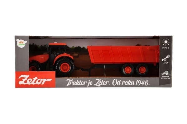 Rode Zetor tractor met aanhanger met geluidseffecten en lichteffecten - 36 cm