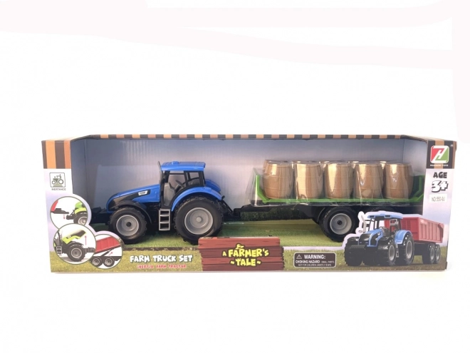 Tractor met vliegwiel en aanhanger vol hooi