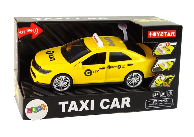 Taxi-auto 1:14 met licht en geluid – geel