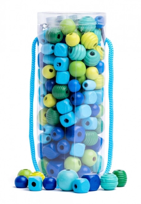 Groene en blauwe kralen in een buis