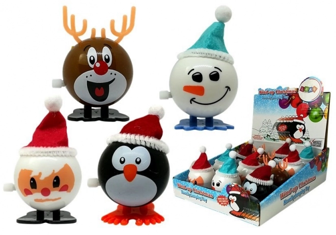 Set van 12 opwindbare kerstspeeltjes pinguïn rendier sneeuwpop Kerstman