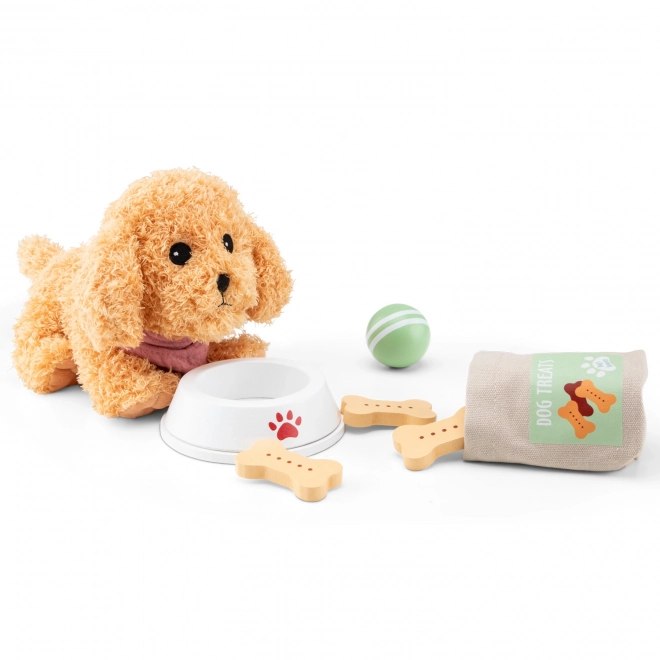 Kinderset voor de verzorging van een pluchen hondje