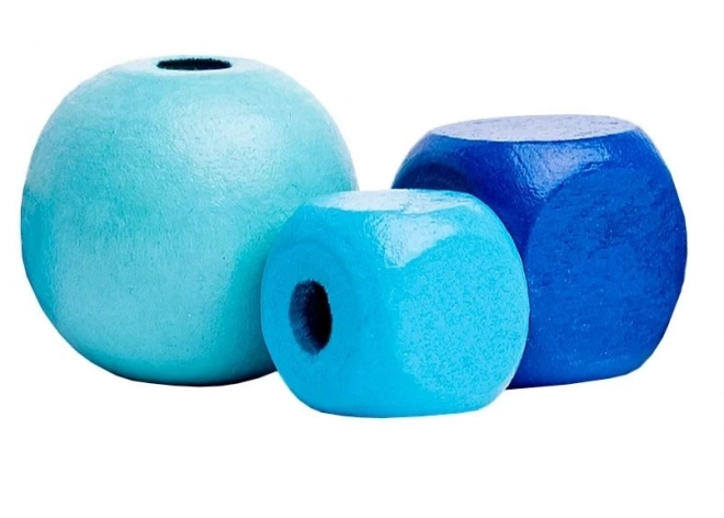 Groene en blauwe kralen in een buis