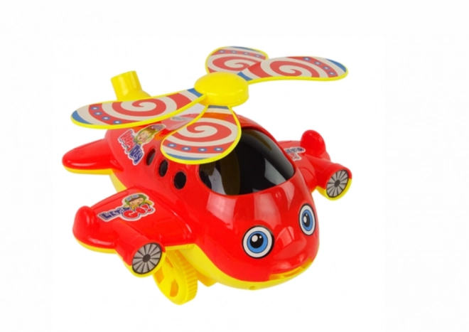 Vrolijke speelgoedhelikopter met stok