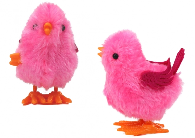 Springend roze kuiken speelgoed
