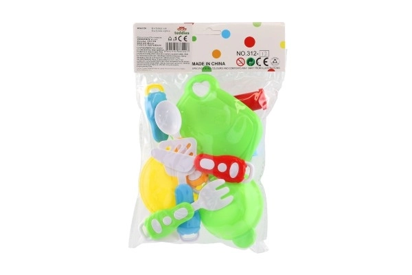 Set van plastic serviesgoed in zak 18,5x26x6cm
