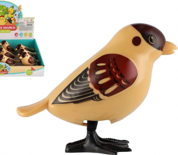 Springende vogeltje op sleutel 11 cm