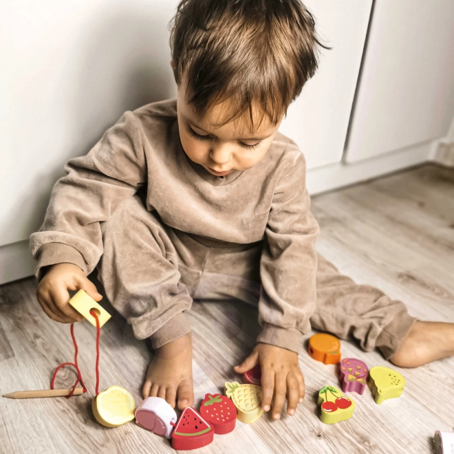 Houten rijgblokken met fruit