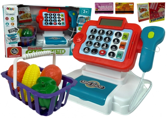 Kinderspeelkassa met rekenmachine en groentemand