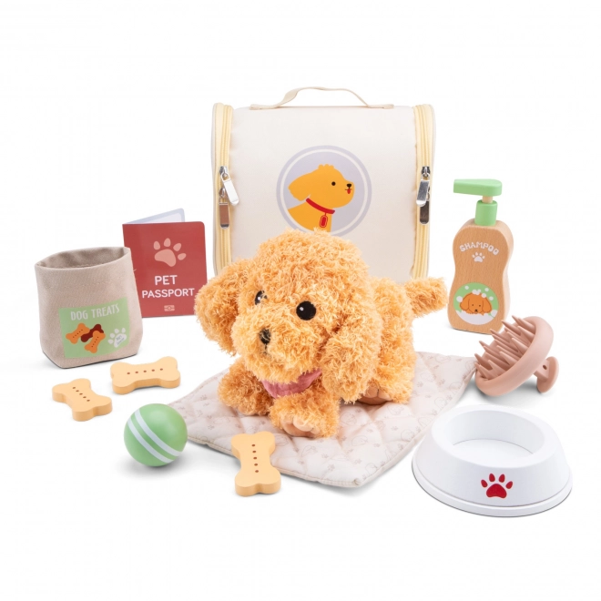 Kinderset voor de verzorging van een pluchen hondje