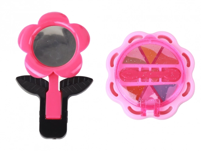 Stijlvol roze kinderkoffertje met cosmetica-accessoires