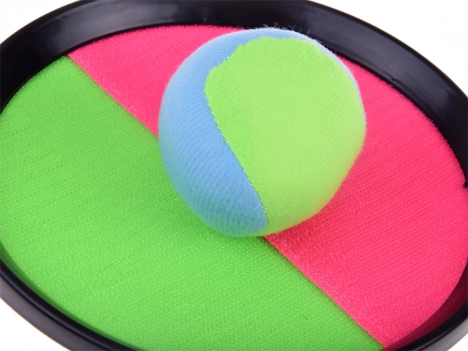 Spel met vangststokken en klittenbandballen