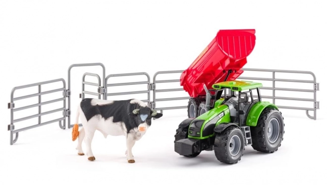 Tractor met aanhanger en stier met tuin
