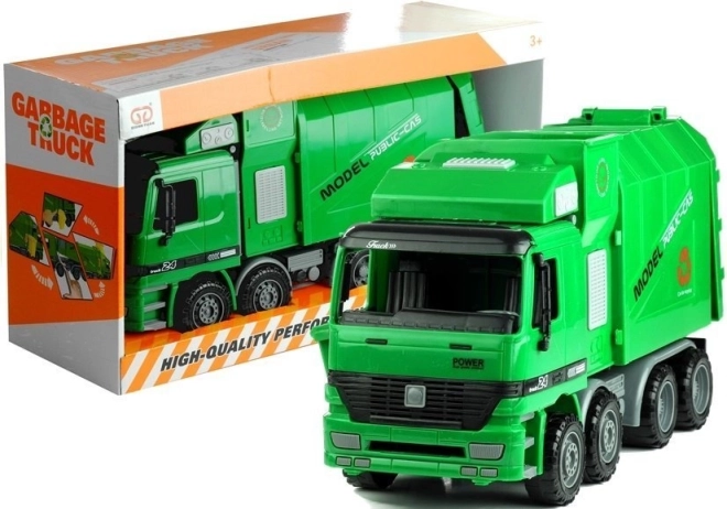 Grote groene speelgoedvuilniswagen met openslaande laadbak en aanklikbare afvalbak