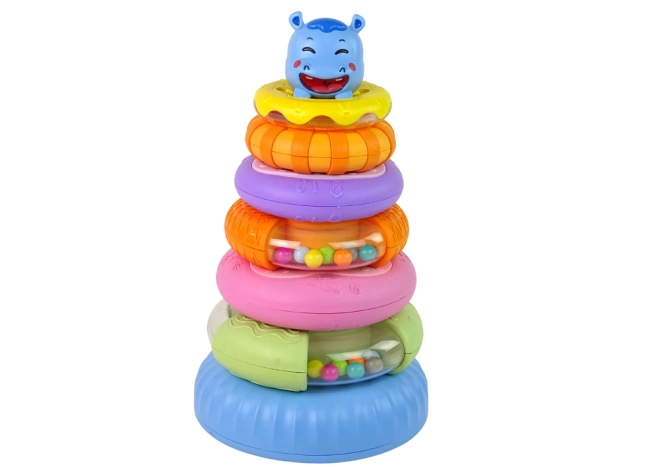 Educatieve piramide met gekleurde ringen / donuts