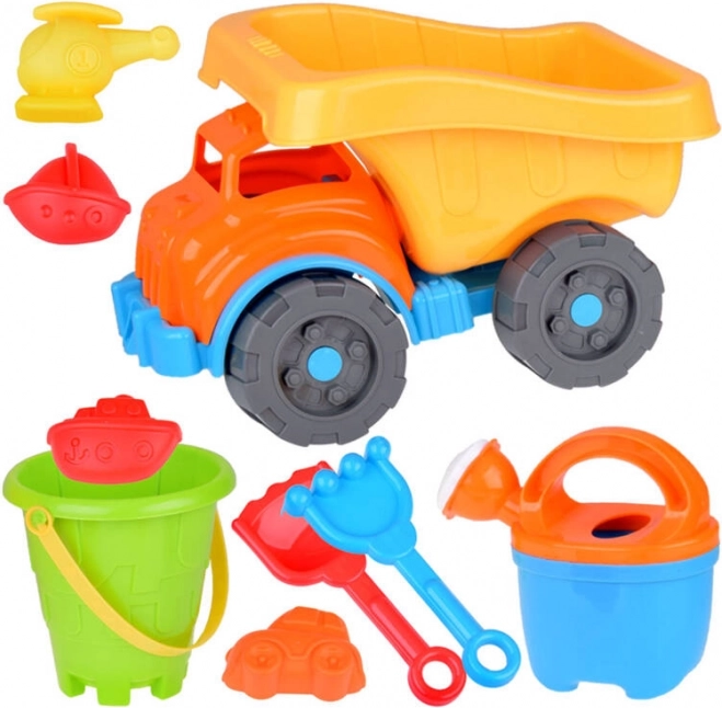 Grote set zand kiepwagen met vormpjes, schep en hark