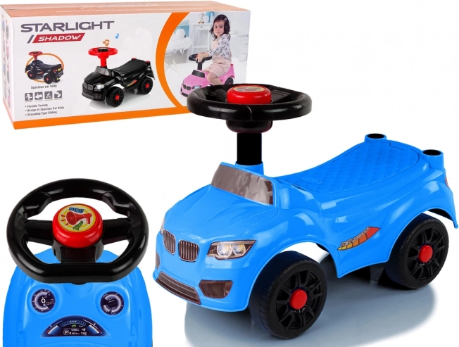 Blauwe loopauto met toeter