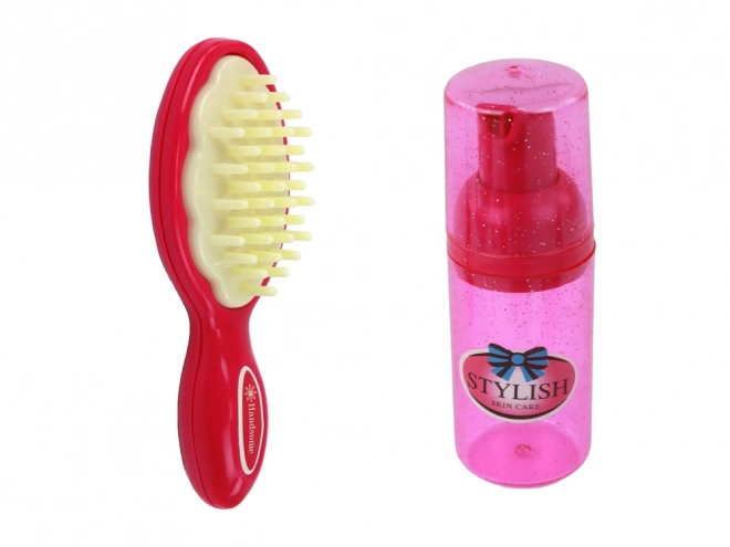 Stijlvol roze kinderkoffertje met cosmetica-accessoires