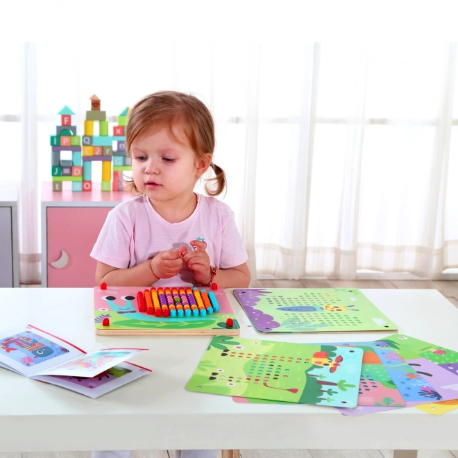 Houten puzzel met pinnetjes van Tooky Toy