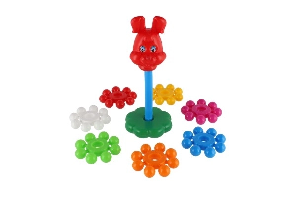 Stapelbare piramide met ringen van plastic 26cm in net 12m+