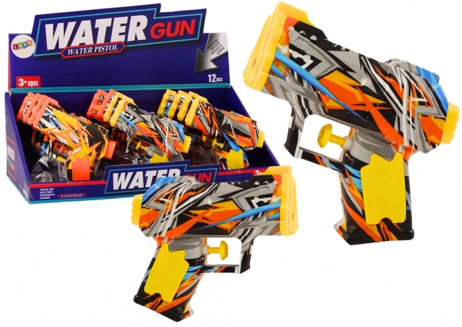 Kleine waterpistool geel oranje graffiti